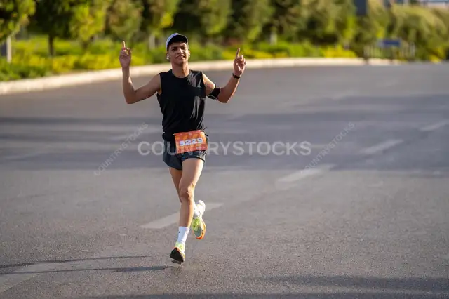 Runner Celebrating During a Marathon in Cairo