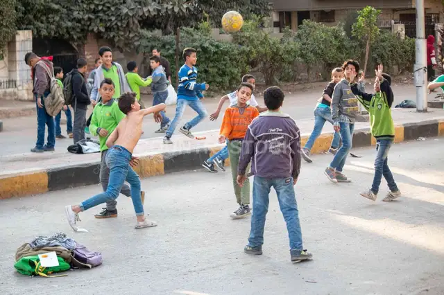 Boys Playing Street Football on Sudan Street Cairo