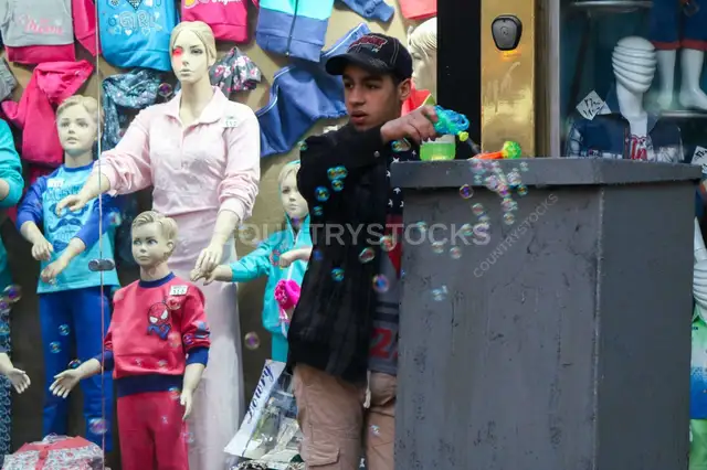 Bubble Seller in Downtown Cairo (Wust el Balad) (Wust el Balad) Street Scene