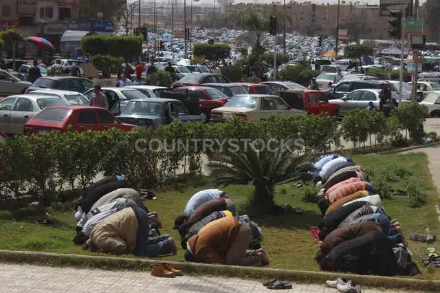 Friday Prayer at the Car Market in Nasr City – A Spiritual Scene Amidst Urban Hustle