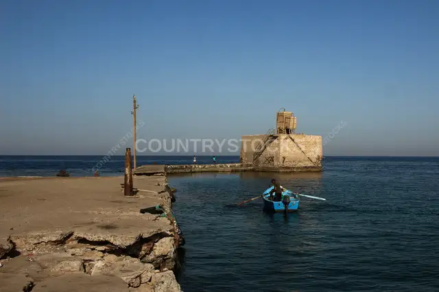 Fisherman Rowing Boat at Al-Quseir Old Harbor