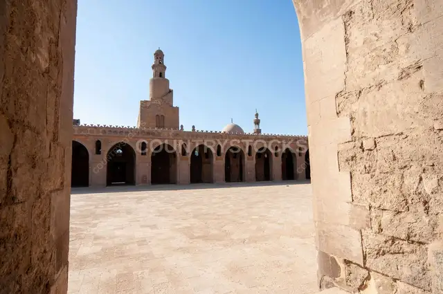 Architectural view of the central dome and spiral minaret of the historic Ahmad Ibn Tulun Mosque in Old Cairo, Egypt - 5