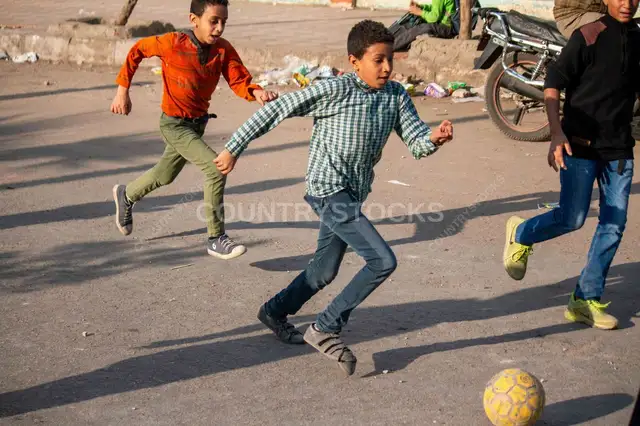 Children Playing Street Football on Sudan Street Cairo