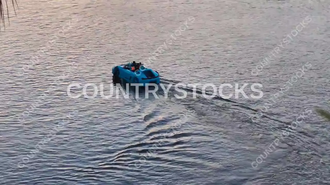 Blue Amphibious Car on Nile River, Al-Daqahliya Sunset