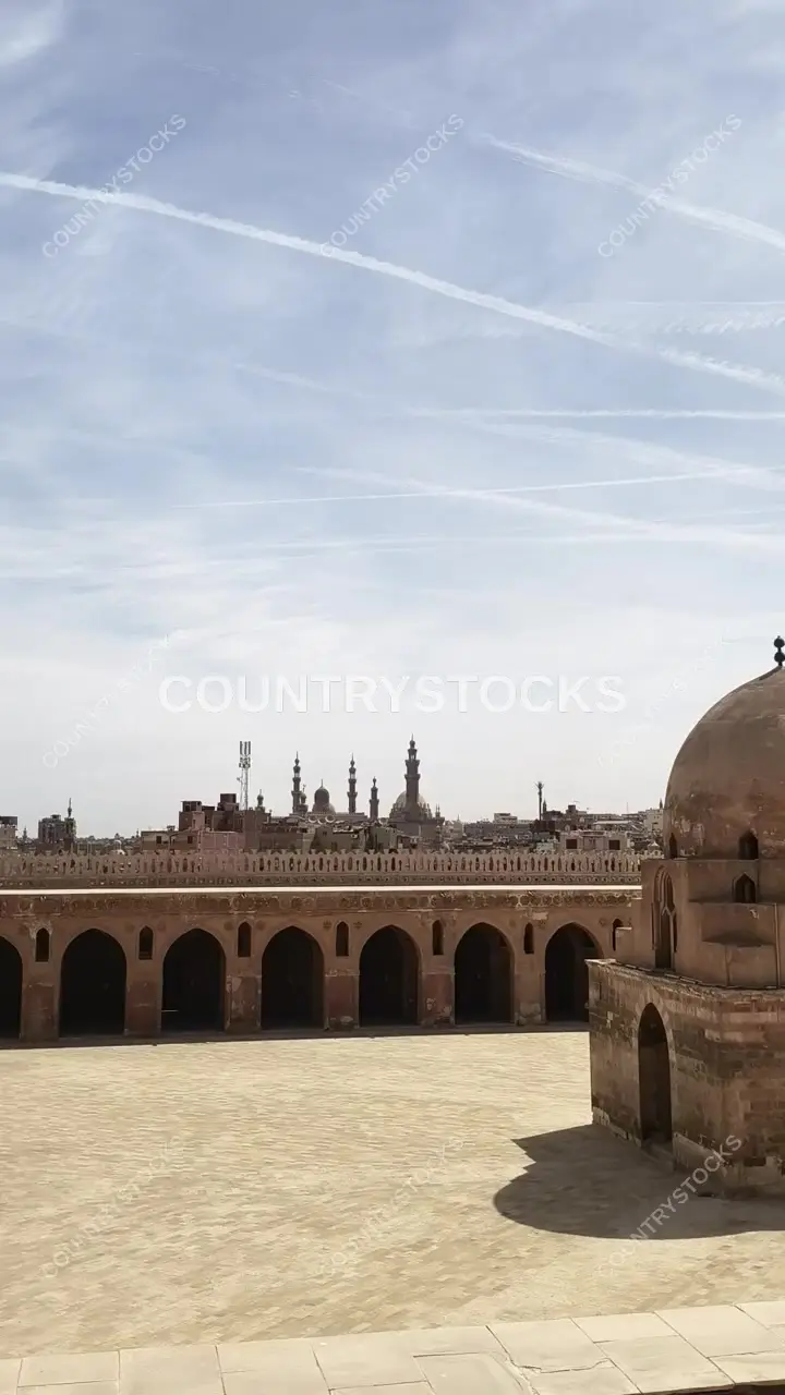 Ibn Tulun Mosque Courtyard with Cairo Skyline