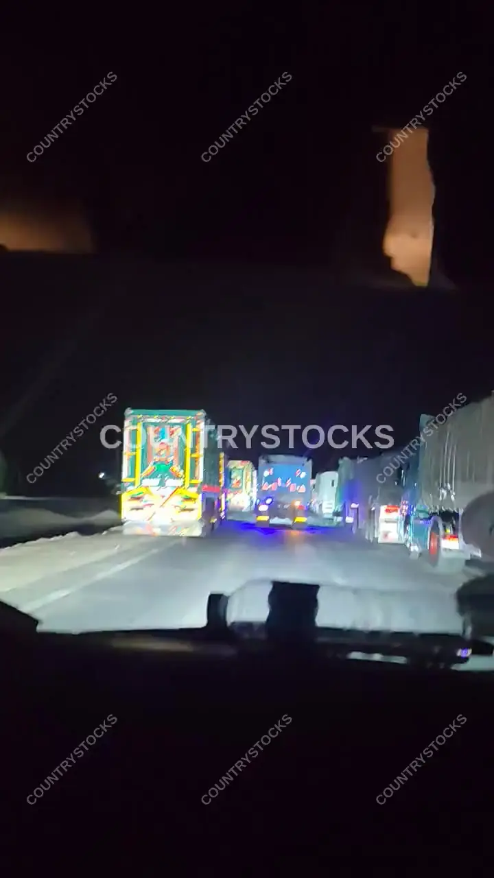 Heavy Truck Traffic Jam at Night, Desert Road Egypt