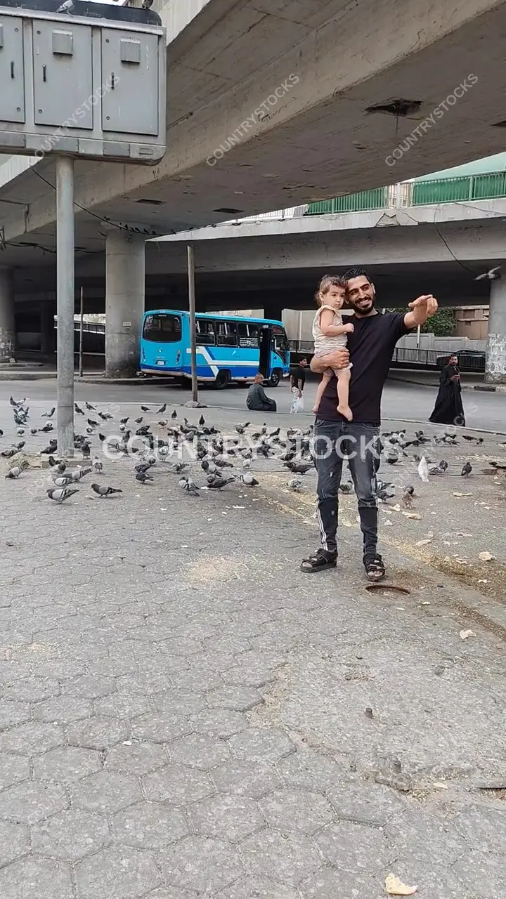 Father and Child Feeding Pigeons, Abdel Moneim Riad Square