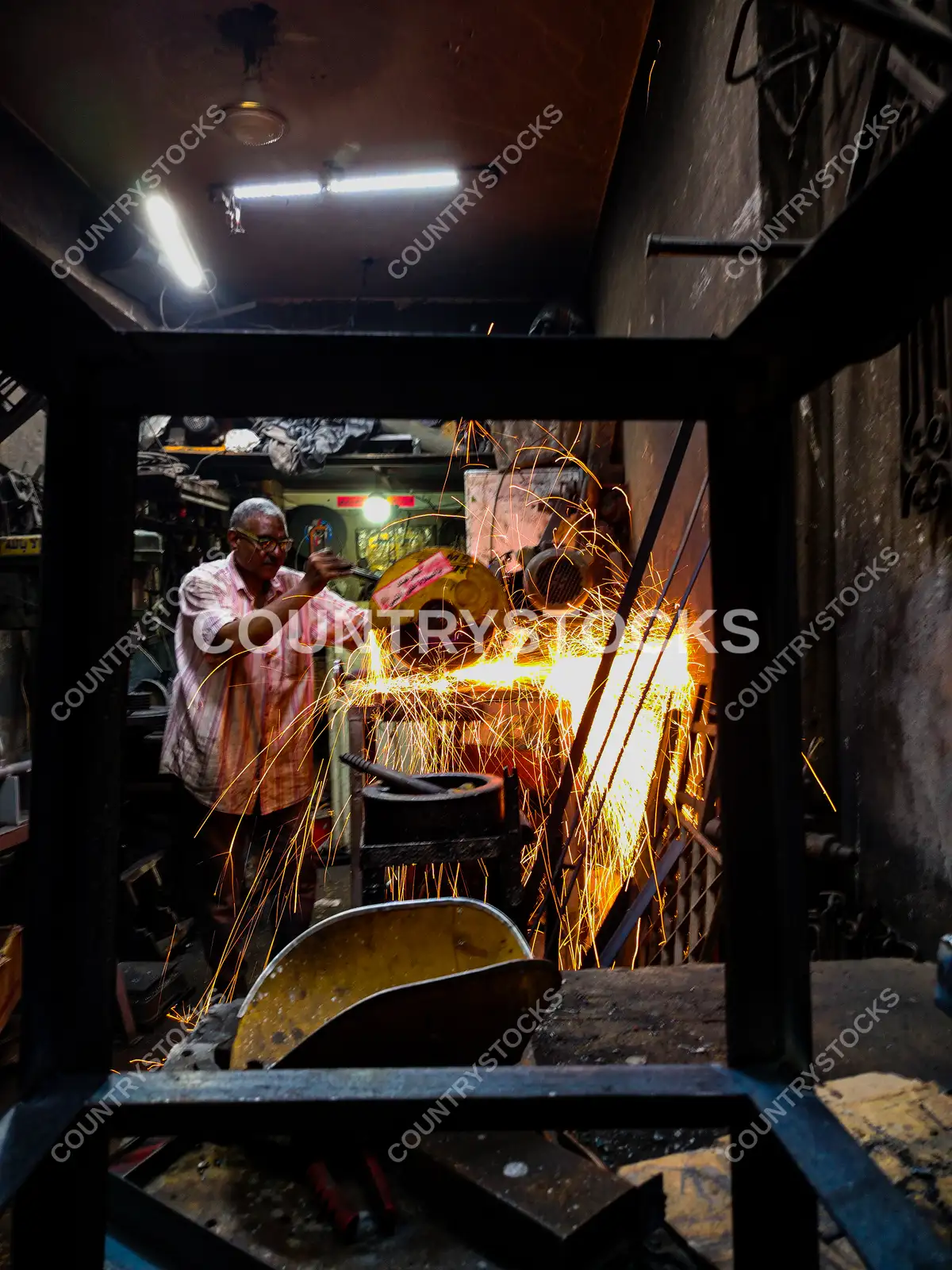 Blacksmith Grinding Metal, Sparks Flying, Cairo